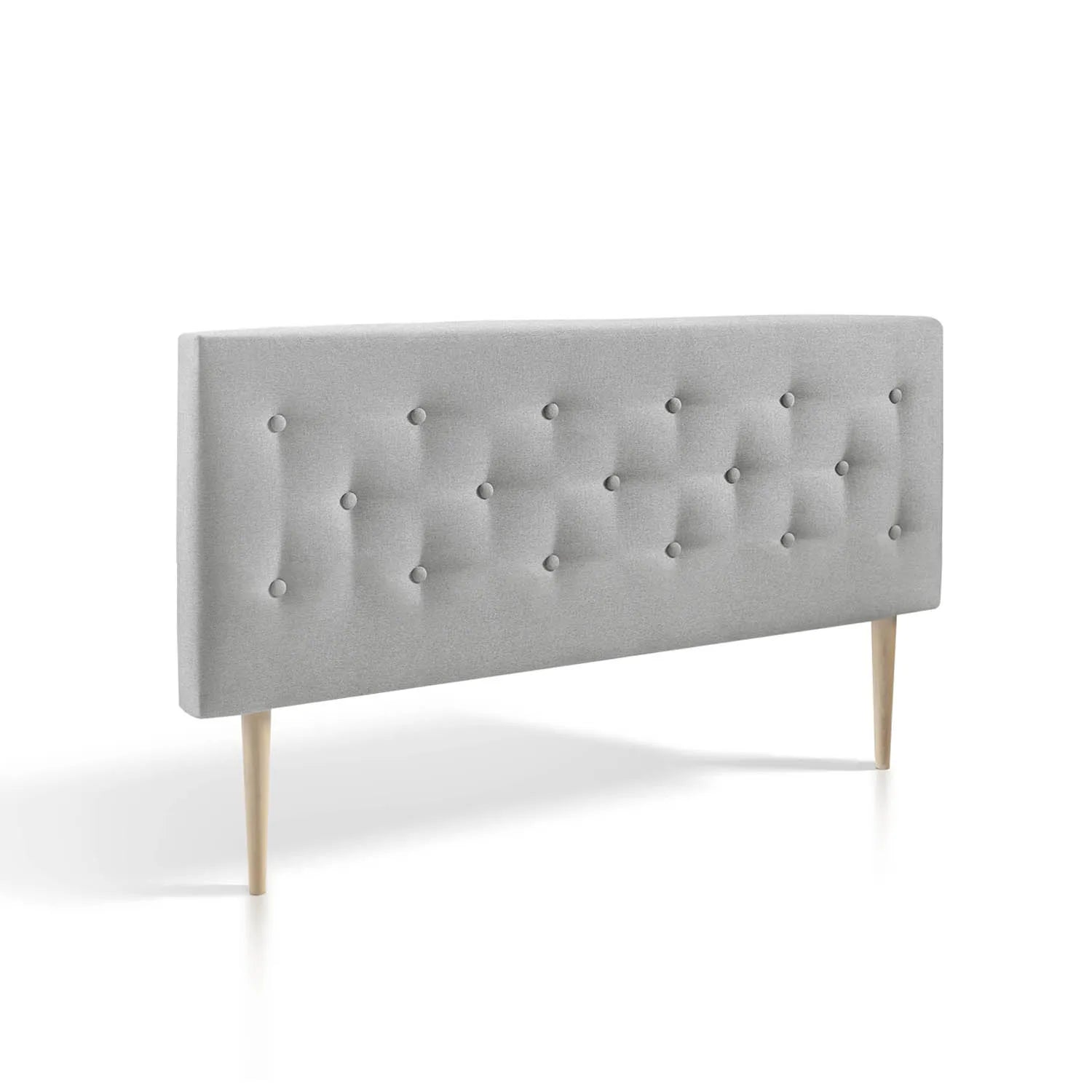 Cabecero tapizado Oslo en color gris, diseño escandinavo, 150x100cm, fabricado en poliéster resistente a las manchas, patas de madera maciza de haya, acolchado para mayor comodidad, apto para montaje en pared, perfecto para realzar el estilo de tu dormito