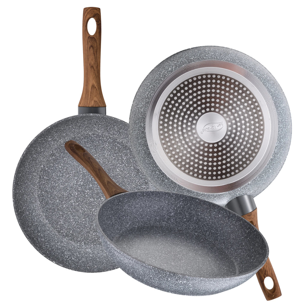 Juego de utensilios de cocina San Ignacio de 8 piezas en acero inoxidable para inducción, que incluye 4 ollas con tapas de vidrio (1,9 L-5,1 L) y 3 sartenes antiadherentes (Ø22-26 cm), perfectas para cocinar de manera eficiente y duradera.