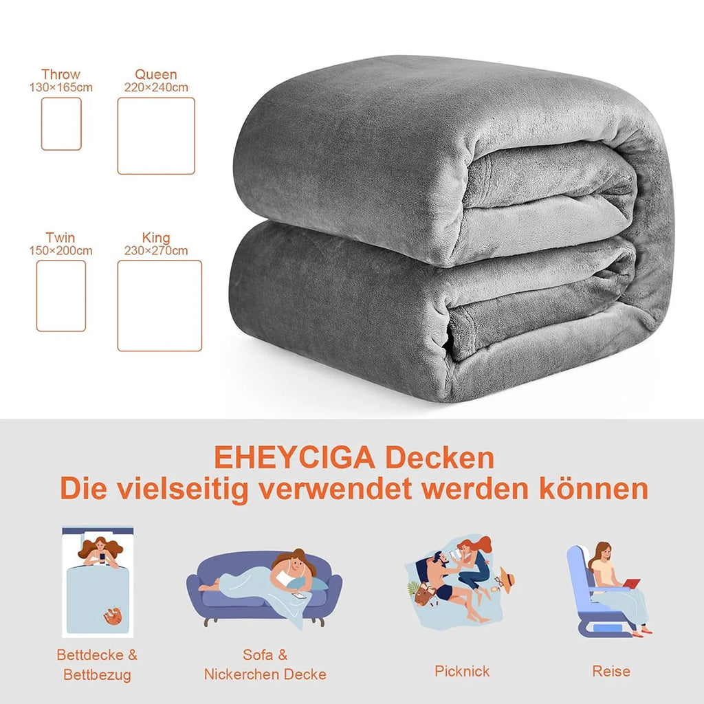 Manta HOMESOL® Soft Touch para cama y sofá, confeccionada en 100 % poliéster de microfibra, ligera y antiarrugas, perfecta para que adultos y niños se mantengan abrigados durante los días fríos. Una acogedora manta navideña para cualquier ocasión.