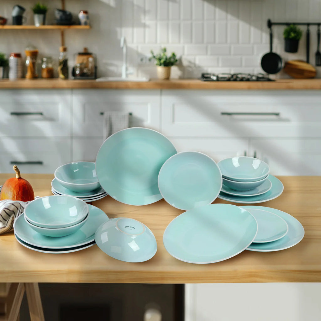 Transforma tus comidas con el juego de vajilla de cerámica Santa Elena, que incluye 18 piezas en un elegante color verde para 6 personas. Duradero, apto para lavavajillas y microondas, este juego ergonómico es perfecto para disfrutar de la mesa con estilo