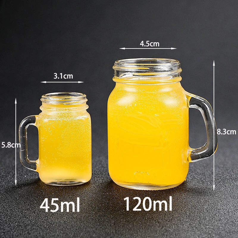 Juego de 4 mini vasos de cristal tipo tarro Mason con asas de cristal, ideales para beber whisky.