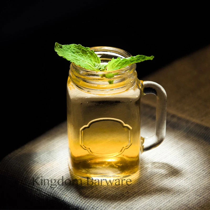 Juego de 4 mini vasos de cristal tipo tarro Mason con asas de cristal, ideales para beber whisky.
