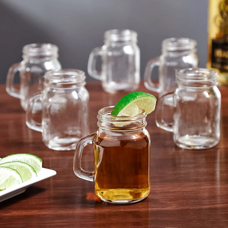 Juego de 4 mini vasos de cristal tipo tarro Mason con asas de cristal, ideales para beber whisky.