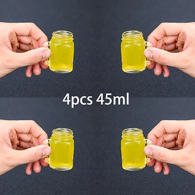 Juego de 4 mini vasos de cristal tipo tarro Mason con asas de cristal, ideales para beber whisky.