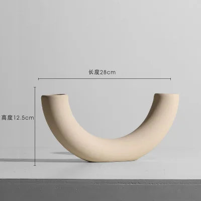 Jarrón de mesa minimalista nórdico de cerámica con adornos de flores secas, arreglo floral irregular y creativo, ideal para decorar la sala de estar.