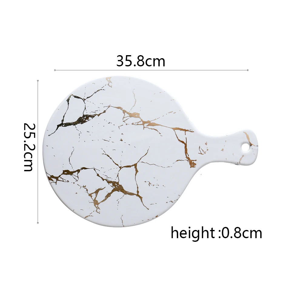 Vajilla de cerámica blanca, negra y dorada, ideal para pizza, postres, filetes y como bandeja decorativa.
