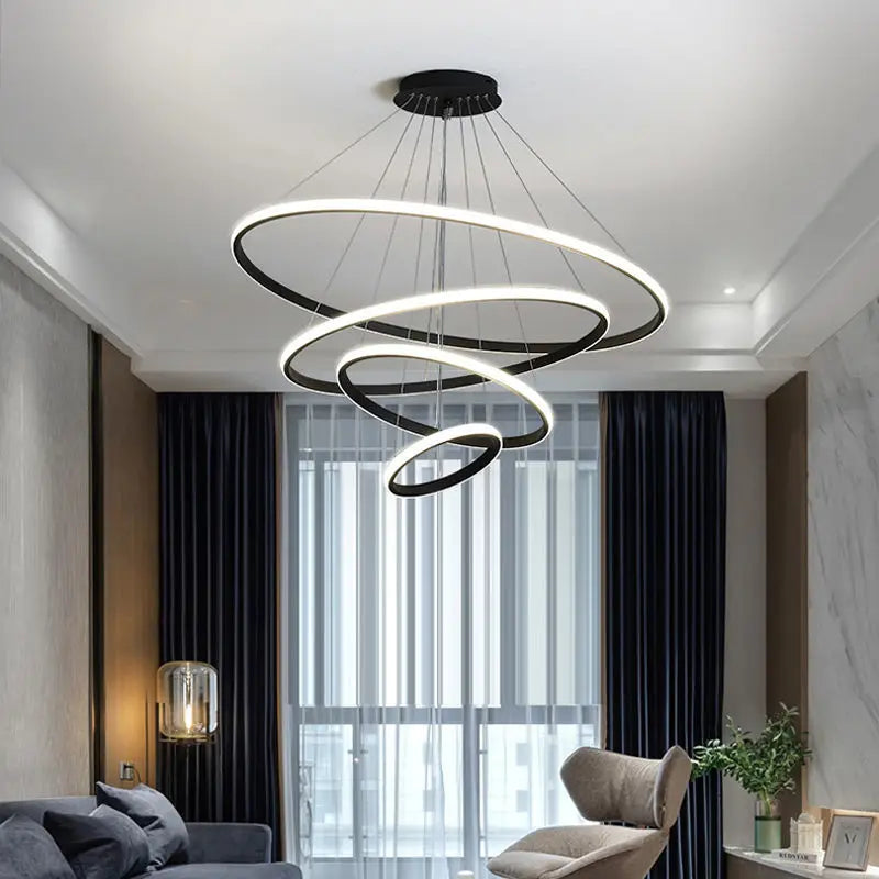 Lámpara colgante moderna con anillos LED circulares, araña de techo negra, ideal para lofts, salas de estar, comedores y cocinas. Iluminación interior.