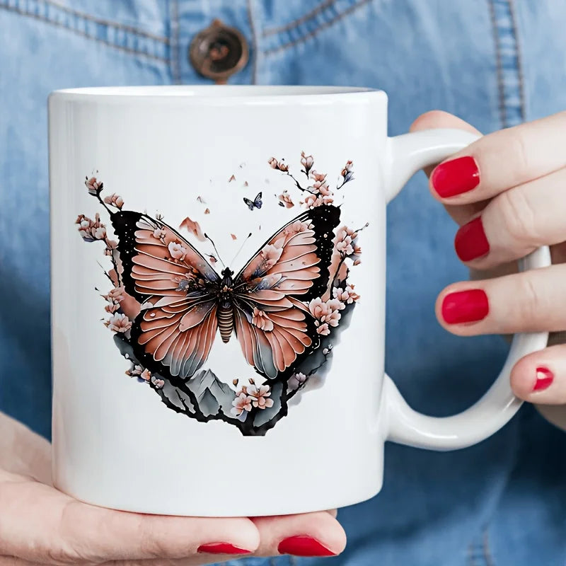 Taza de cerámica con diseño floral de mariposas: elegante taza de café blanca con diseño de mariposas rosas y flores de cerezo, apta para microondas y reutilizable.