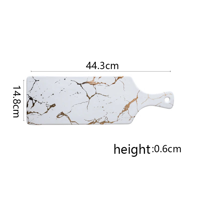Vajilla de cerámica blanca, negra y dorada, ideal para pizza, postres, filetes y como bandeja decorativa.