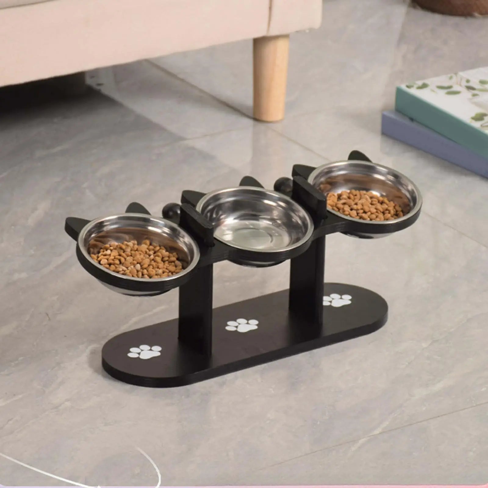 Comedero elevado para gatos con estructura de soporte de madera negra, cuencos de acero inoxidable para gatos, soporte inclinado de 15°, suministros para alimentación y agua.