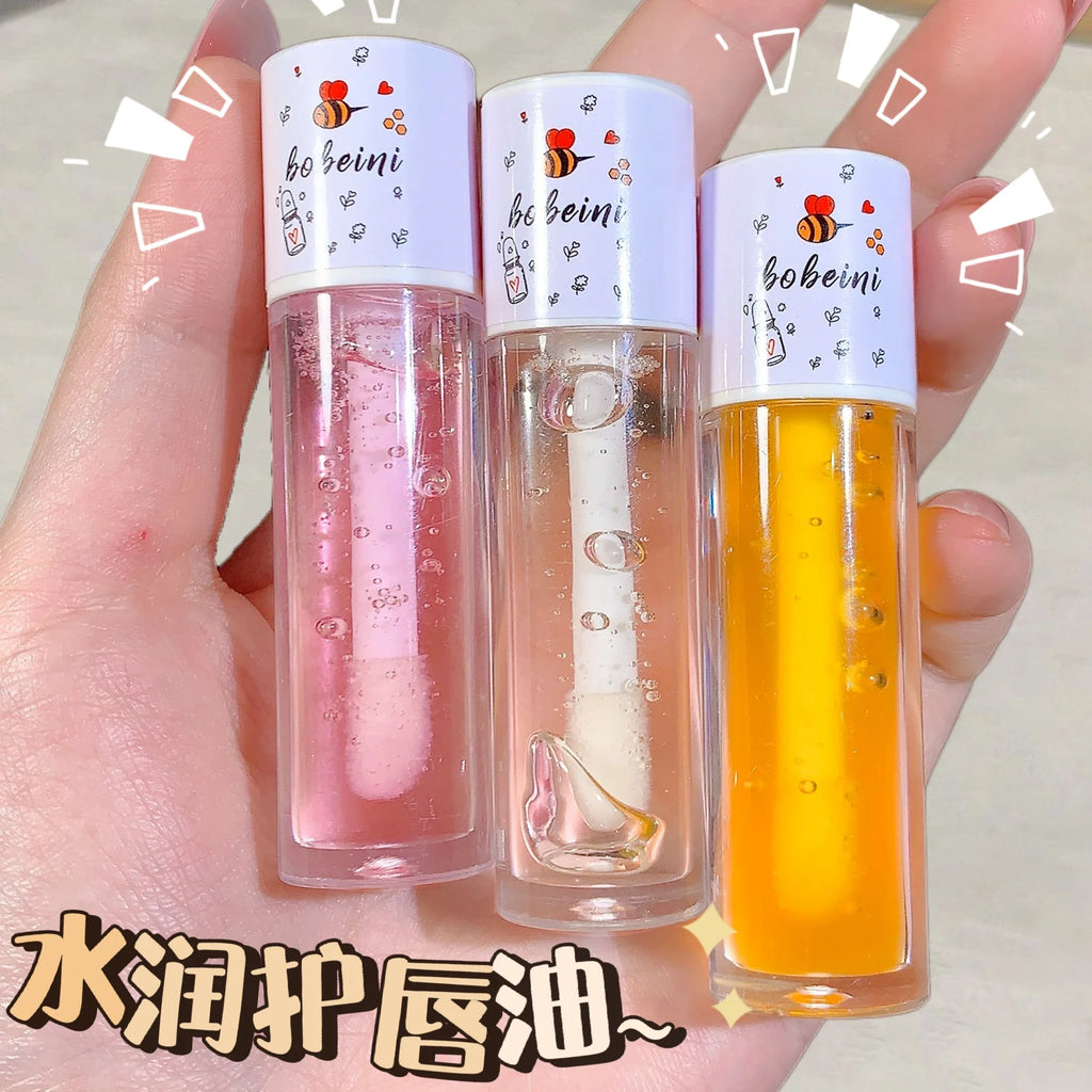 Aceite labial de miel y melocotón, voluminizador, hidratante, no pegajoso, brillo, bálsamo labial líquido transparente de larga duración.
