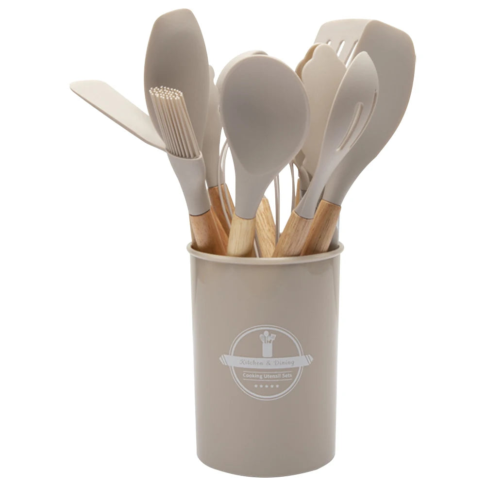 Juego de 12 piezas de utensilios de cocina de silicona antiadherentes: espátula, pala, cuchara, brocha, batidor, mango de madera.