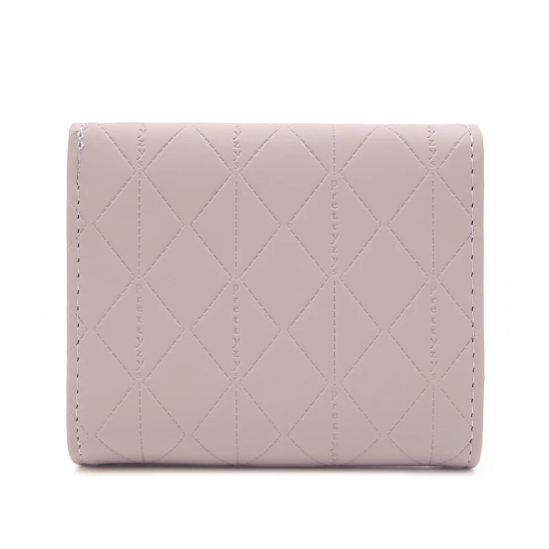 Cartera corta para mujer, nueva, de otoño e invierno, fabricada en Japón y Corea del Sur, pequeña, fresca, de PU, plegable, con colgante de hoja y tres pliegues.