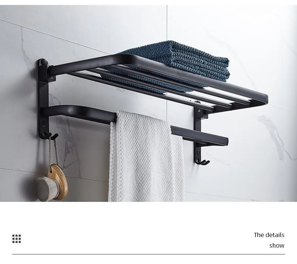 Toallero plegable de aluminio de 50 cm en negro mate con gancho para montaje en pared.