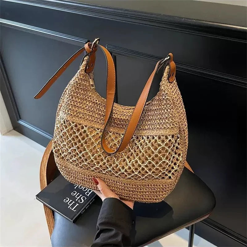 Bolso de hombro hueco para mujer con correa ajustable, tejido de paja, bolso de viaje, bolso de mano de moda, bolso de verano para uso diario.