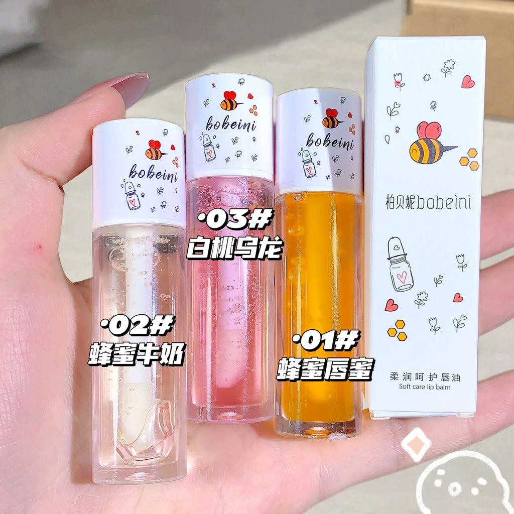 Aceite labial de miel y melocotón, voluminizador, hidratante, no pegajoso, brillo, bálsamo labial líquido transparente de larga duración.