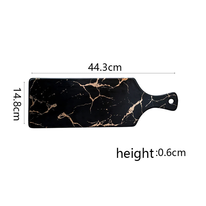 Vajilla de cerámica blanca, negra y dorada, ideal para pizza, postres, filetes y como bandeja decorativa.
