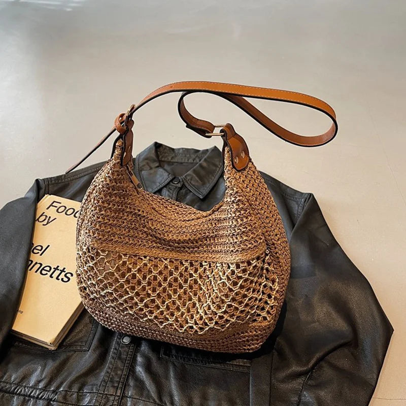 Bolso de hombro hueco para mujer con correa ajustable, tejido de paja, bolso de viaje, bolso de mano de moda, bolso de verano para uso diario.