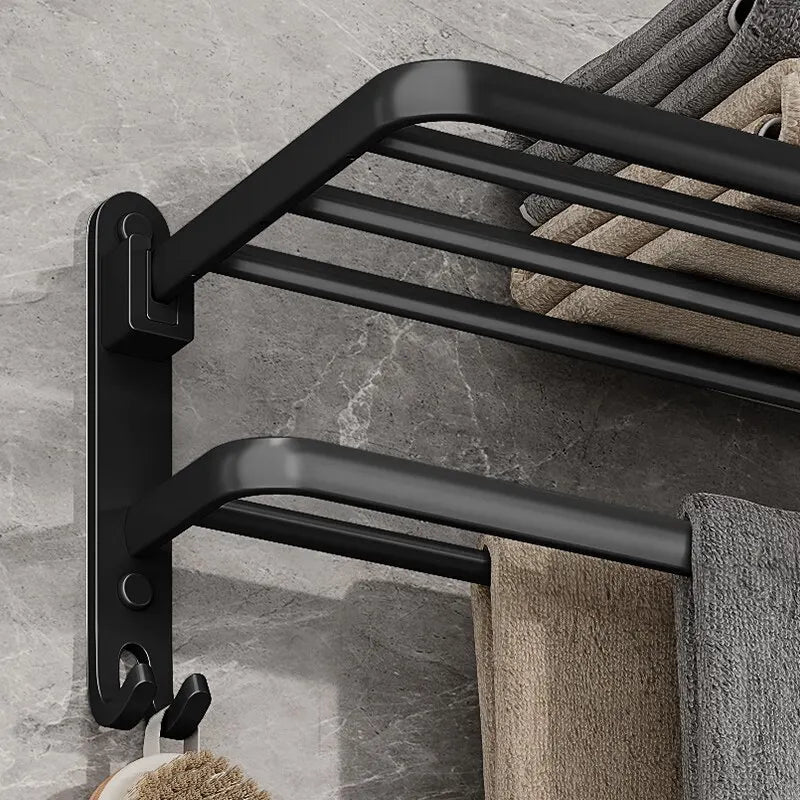 Toallero plegable de aluminio de 50 cm en negro mate con gancho para montaje en pared.
