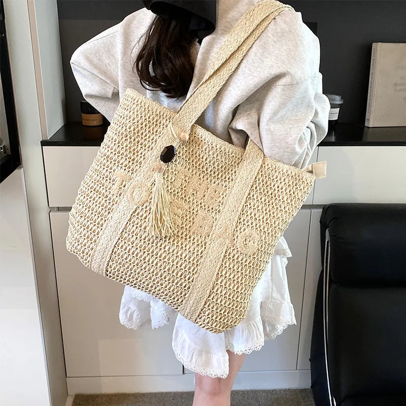 Bolso de paja tejido de gran capacidad estilo francés para mujer, nuevo bolso de hombro para vacaciones en la playa, bolso de mano informal para el día a día.