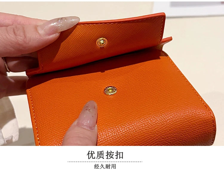 Cartera retro para mujer, gran capacidad, múltiples ranuras para tarjetas, comercio exterior, multifuncional, plegable en tres partes.