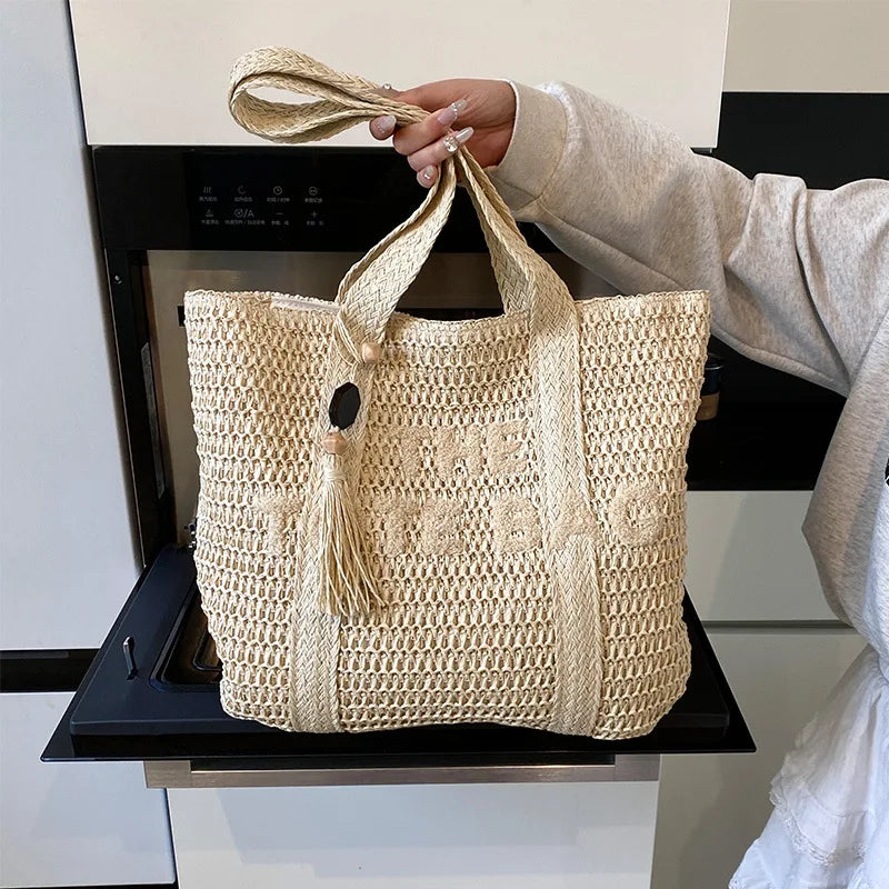 Bolso de paja tejido de gran capacidad estilo francés para mujer, nuevo bolso de hombro para vacaciones en la playa, bolso de mano informal para el día a día.
