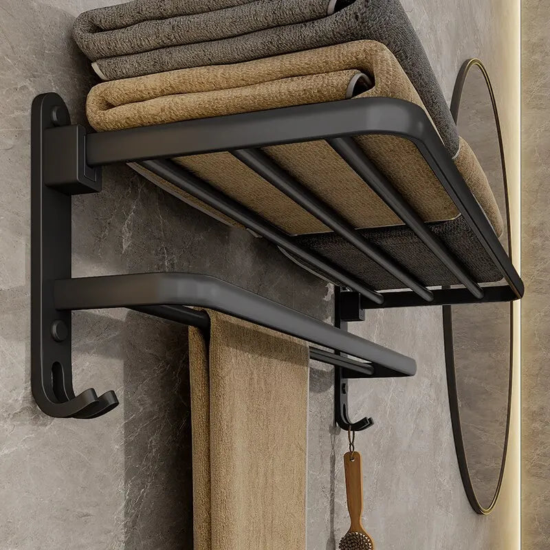 Toallero plegable de aluminio de 50 cm en negro mate con gancho para montaje en pared.