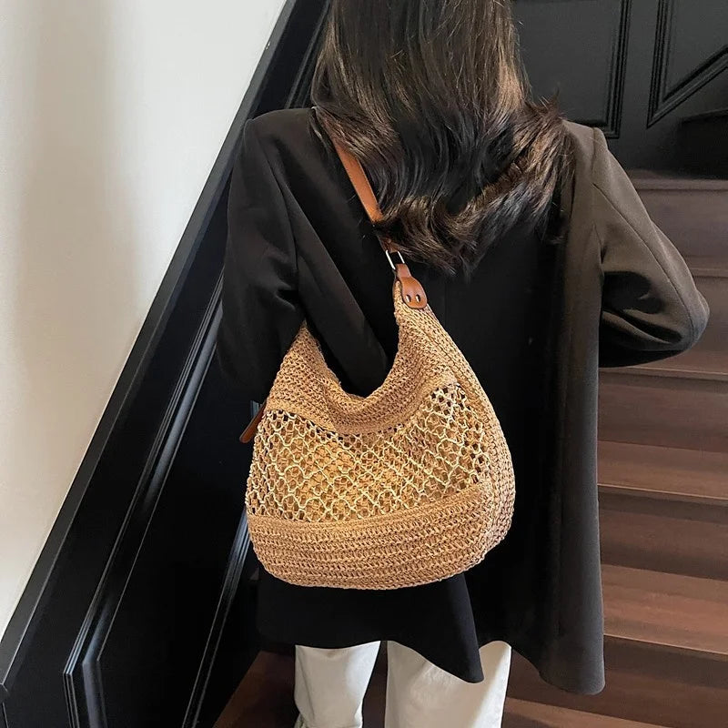 Bolso de hombro hueco para mujer con correa ajustable, tejido de paja, bolso de viaje, bolso de mano de moda, bolso de verano para uso diario.