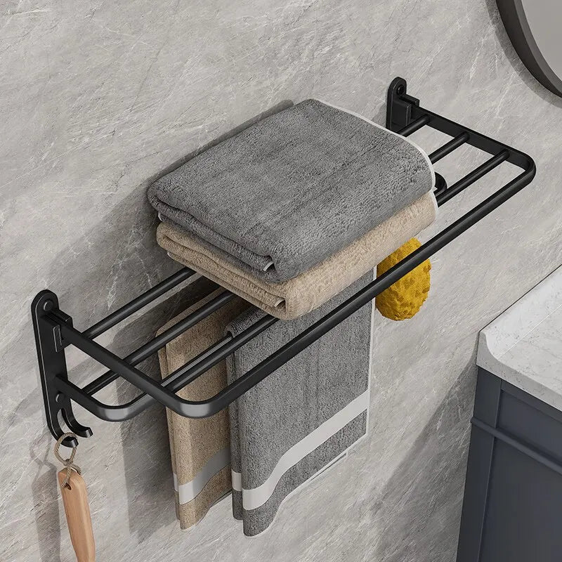 Toallero plegable de aluminio de 50 cm en negro mate con gancho para montaje en pared.