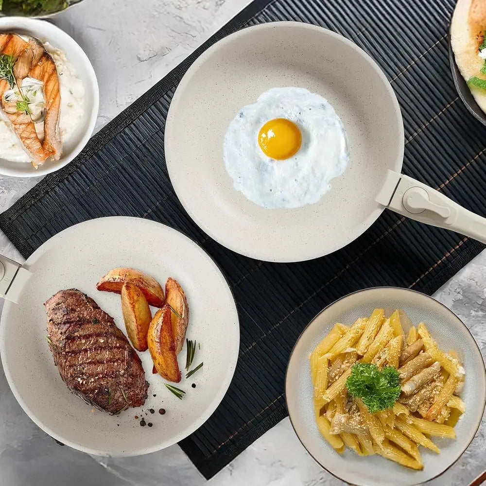 Juego de 12 piezas de utensilios de cocina antiadherentes color blanco crema con mangos desmontables, apto para inducción, lavavajillas y horno.