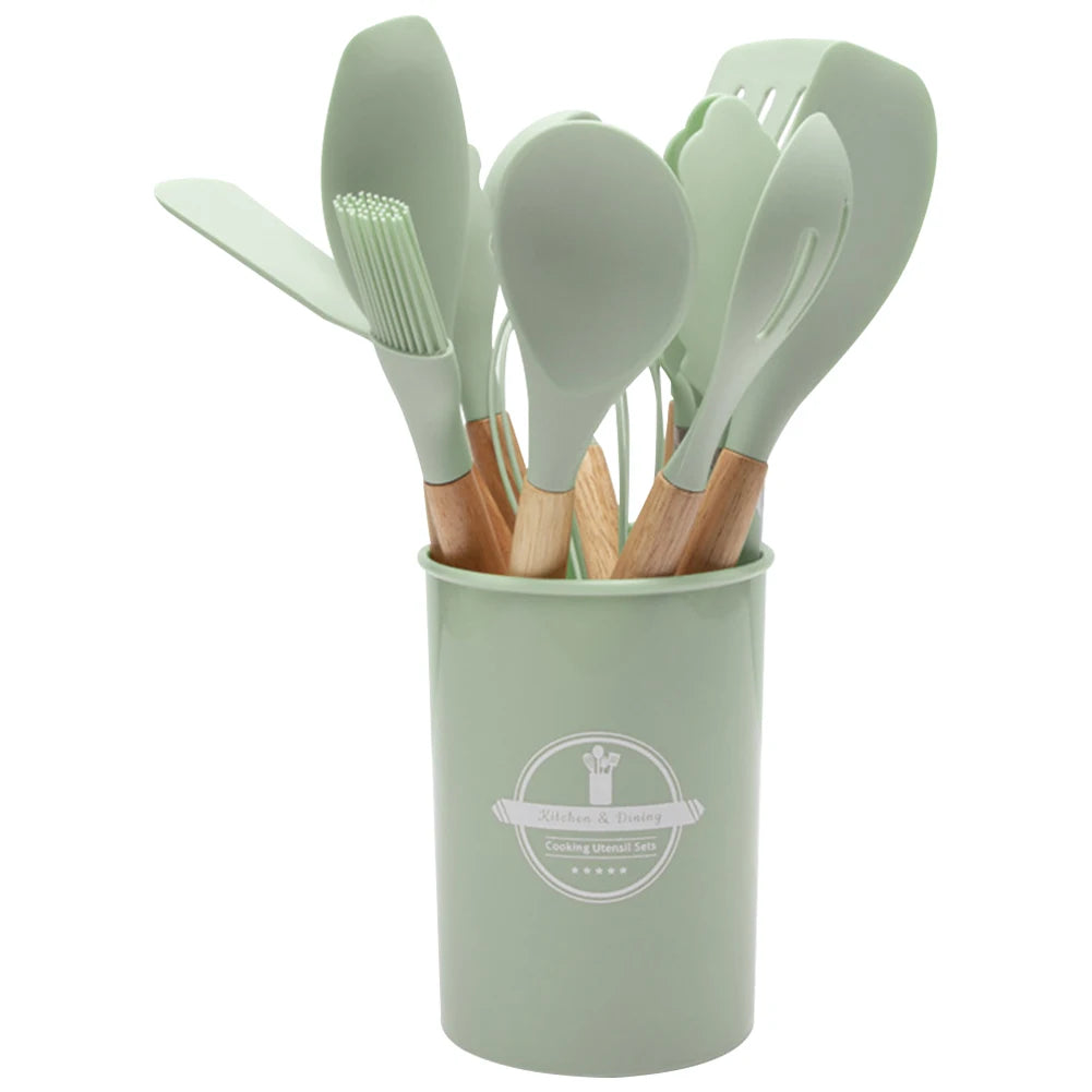 Juego de 12 piezas de utensilios de cocina de silicona antiadherentes: espátula, pala, cuchara, brocha, batidor, mango de madera.