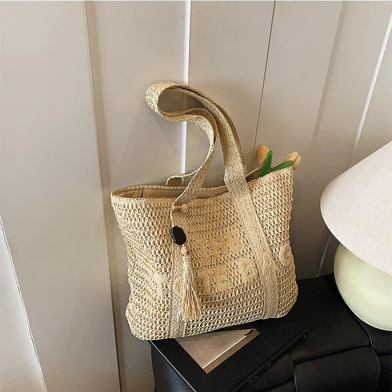 Bolso de paja tejido de gran capacidad estilo francés para mujer, nuevo bolso de hombro para vacaciones en la playa, bolso de mano informal para el día a día.