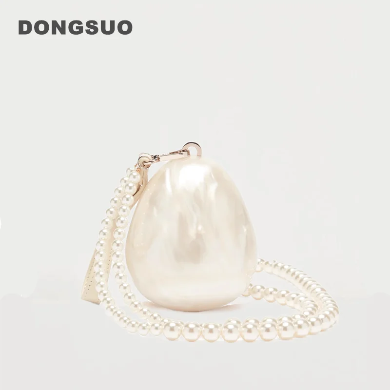 Bolso de mano pequeño acrílico para mujer con forma de huevo, bonito bolso de noche con perlas y correa de cuentas, ideal para bodas y fiestas. Bolso de lujo y cartera de diseñador.