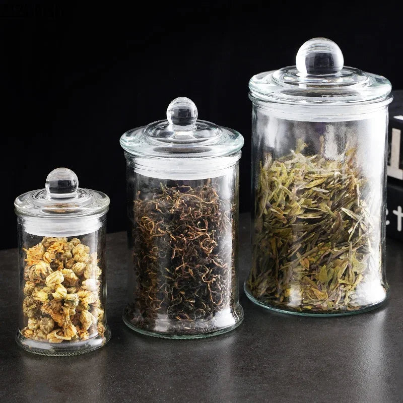 Tarros de almacenamiento de vidrio transparentes minimalistas con tapa, ideales para té, dulces, decoración de escritorio o como dispensador de cereales.