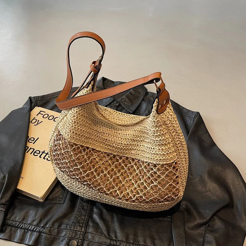 Bolso de hombro hueco para mujer con correa ajustable, tejido de paja, bolso de viaje, bolso de mano de moda, bolso de verano para uso diario.