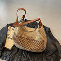 Bolso de hombro hueco para mujer con correa ajustable, tejido de paja, bolso de viaje, bolso de mano de moda, bolso de verano para uso diario.