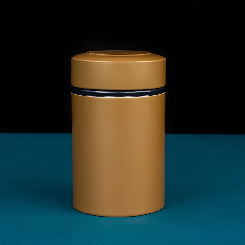 Lata de té metálica portátil de 50 g, recipiente de hojalata para almacenar té y hojas de té secas sueltas.