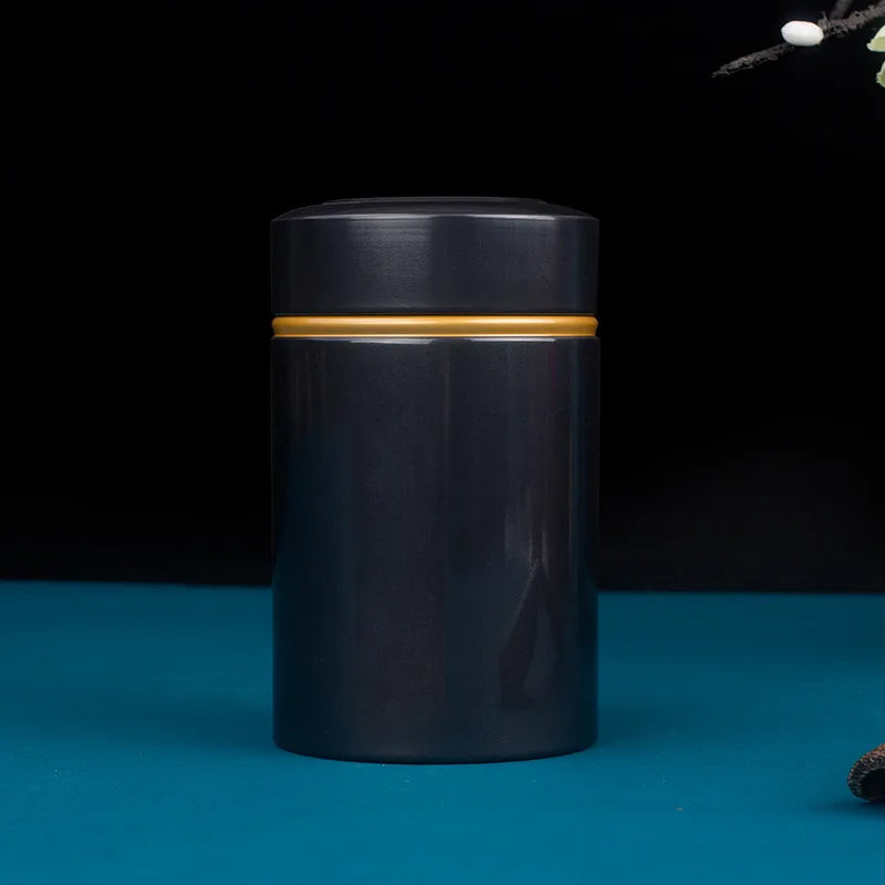 Lata de té metálica portátil de 50 g, recipiente de hojalata para almacenar té y hojas de té secas sueltas.