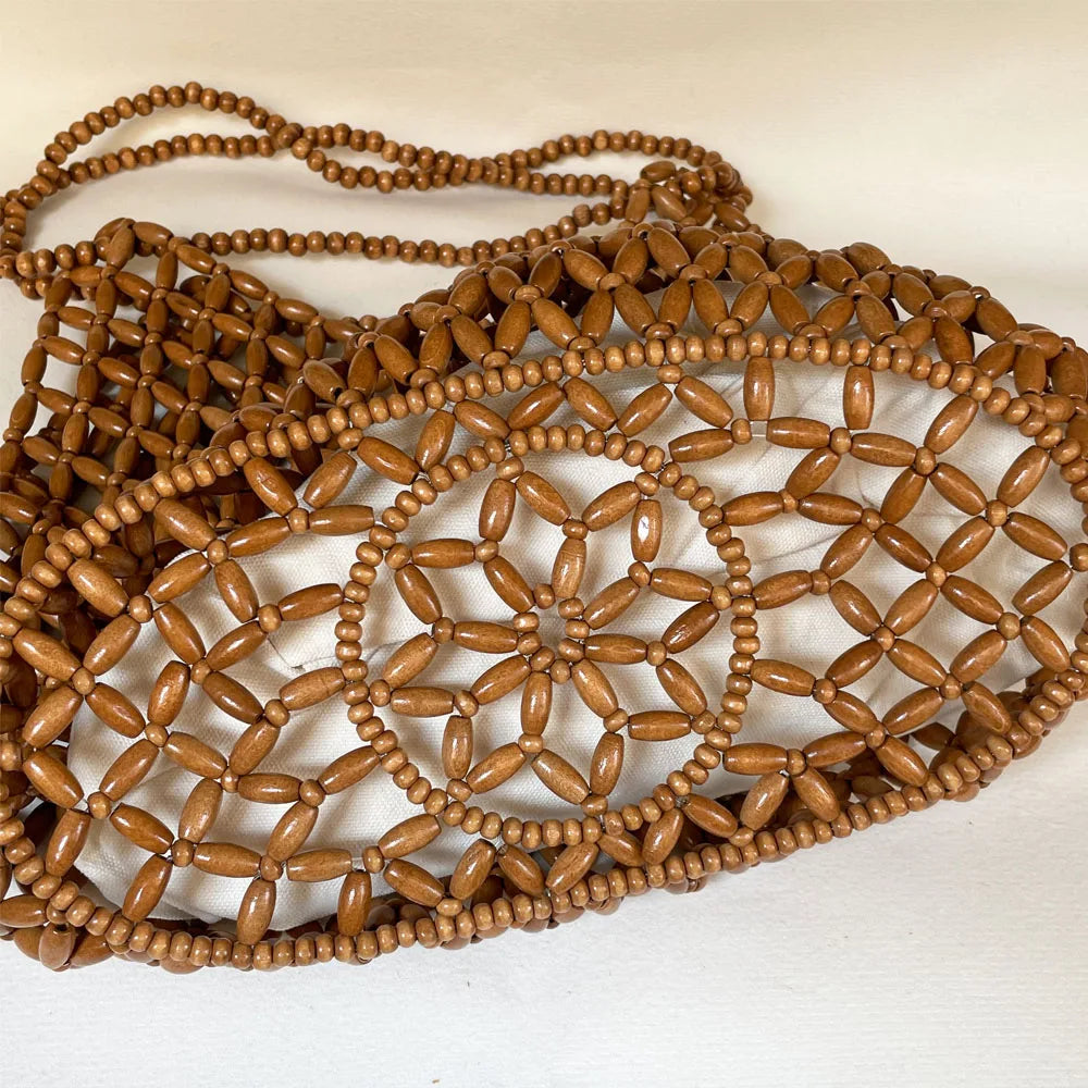 Bolso de mano tejido a mano con cuentas para mujer, exquisito bolso de hombro de madera calada con cuentas, bolso de playa femenino
