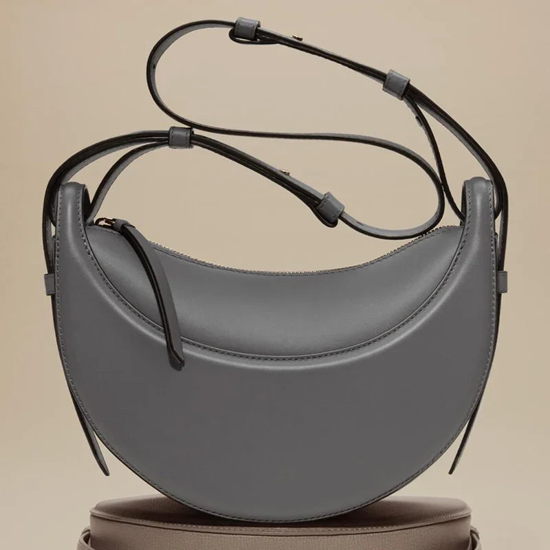 Bolso de hombro de moda para mujer 2026, bolso en forma de media luna, bolso bandolera con cremallera de diseño exclusivo.
