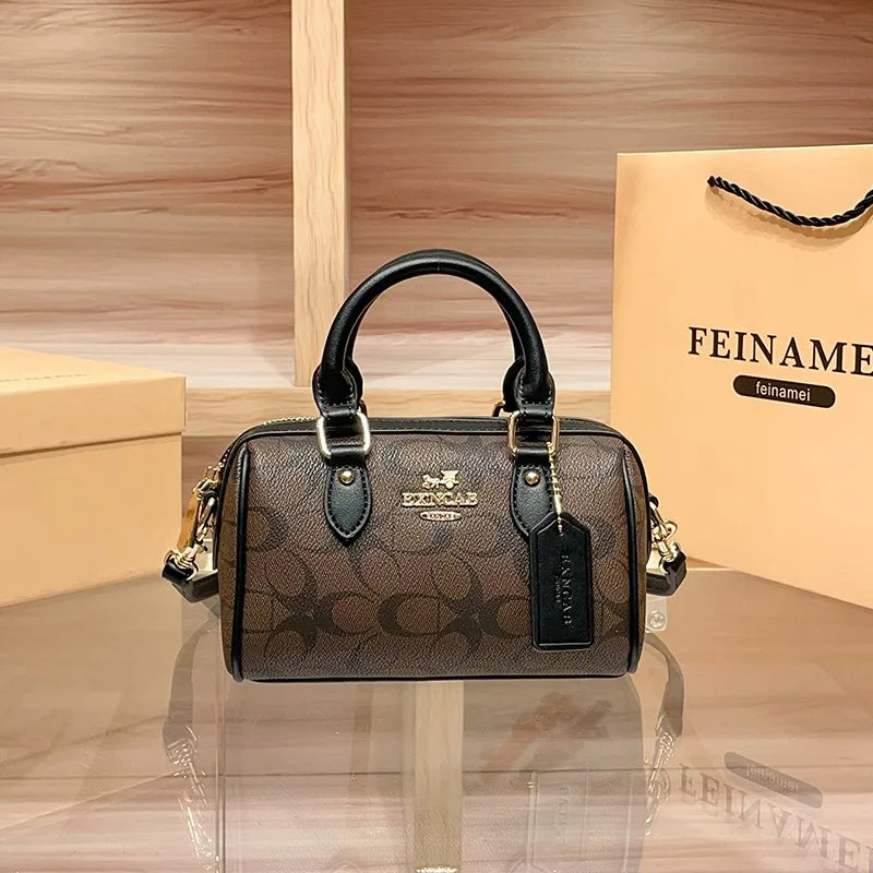 Bolso de mano Boston de lujo ligero para mujer, nuevo bolso bandolera de otoño/invierno 2026, estilo retro de alta gama, bolso de hombro único.