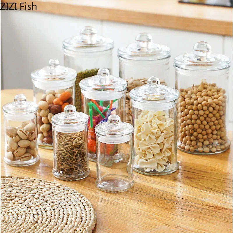 Tarros de almacenamiento de vidrio transparentes minimalistas con tapa, ideales para té, dulces, decoración de escritorio o como dispensador de cereales.