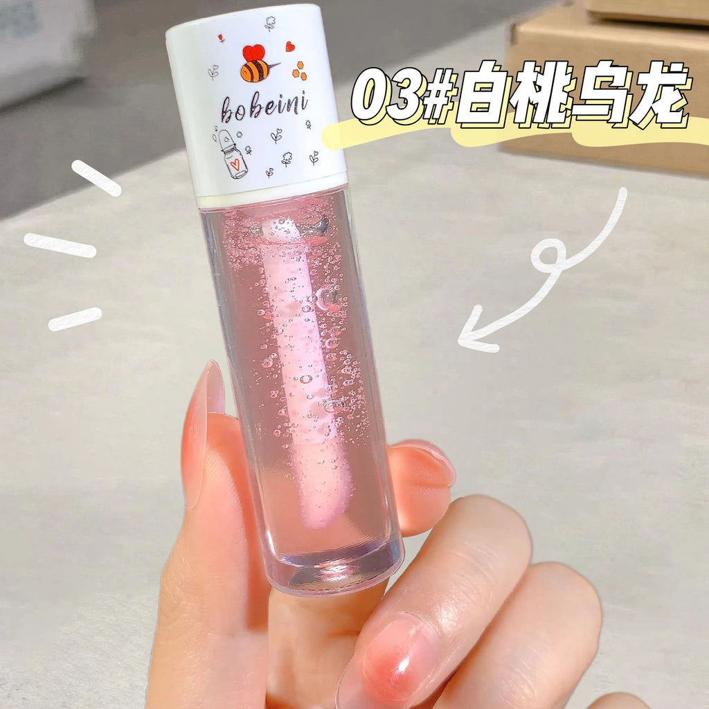 Aceite labial de miel y melocotón, voluminizador, hidratante, no pegajoso, brillo, bálsamo labial líquido transparente de larga duración.