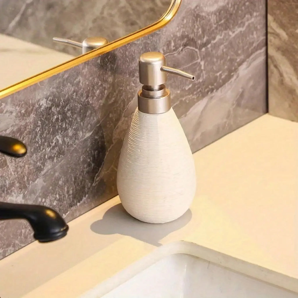 Dispensador de jabón cerámico de estilo retro con bomba, ideal para baños, cocinas y aseos.