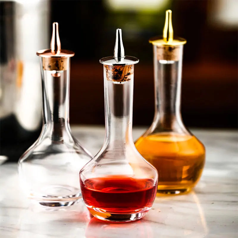 Botella de amargo - Botella de vidrio vintage, botellas decorativas con tapón dosificador, botellas dosificadoras para preparar cócteles, ideal para bartenders.