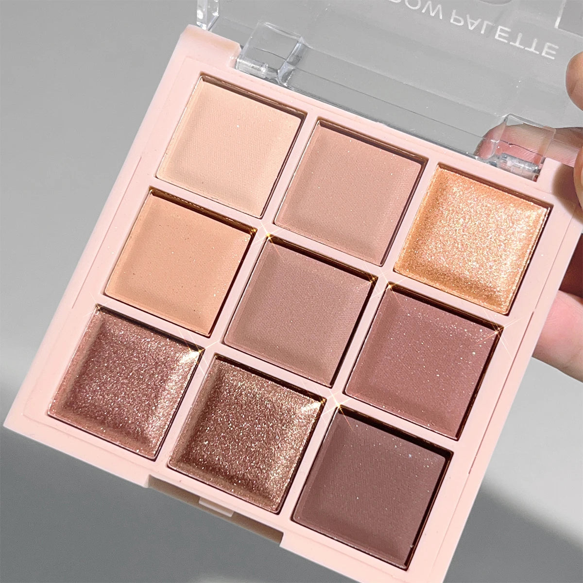 Paleta de sombras de ojos JUJU DREAM de 9 colores, acabado mate y brillante, tonos suaves de té con leche, compacta y fácil de usar para el maquillaje diario de los estudiantes.